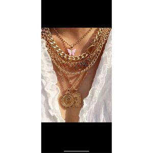 Beautiful seven piece layer necklace, sad adjustable lengths. Have a very well-m